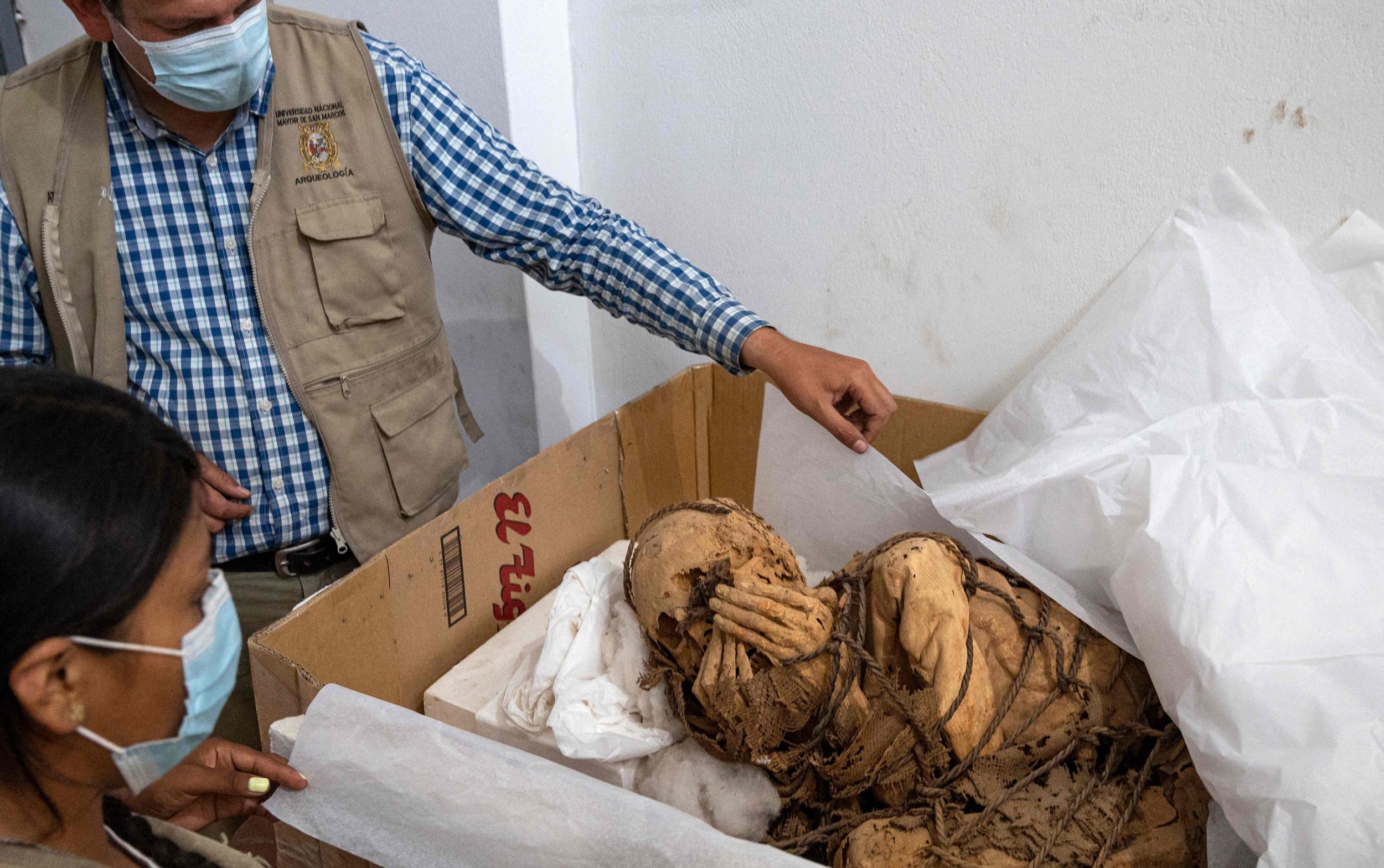 Tomb of horror: Mummy is found with hands bound and covering his face