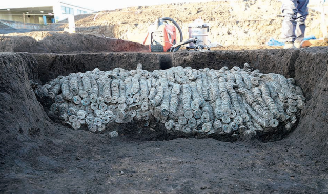 Trove of 100,000 ancient coins unearthed at construction site in Japan, officials say