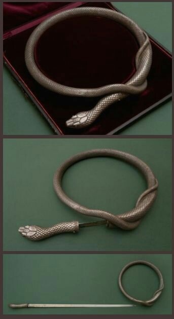 A 19th century masterpiece of the Spanish Arms and Armor — a flexible double-bladed rapier concealed in a silver ring snake sheath. : r/interestingasfuck