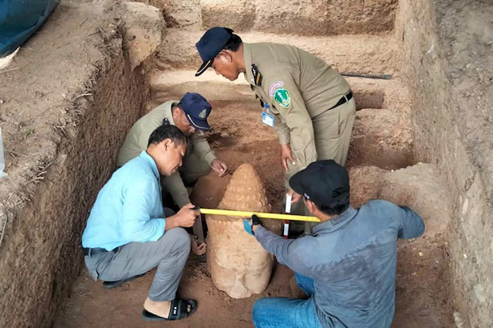 News - Head of a Large Statue Unearthed at Cambodia's Angkor Thom - Archaeology Magazine