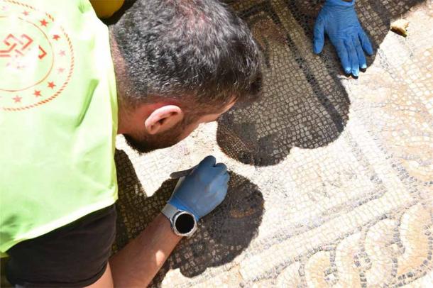 Meticulous cleaning of the Calliope mosaic in Side. (Republic of Türkiye Ministry of Culture and Tourism)