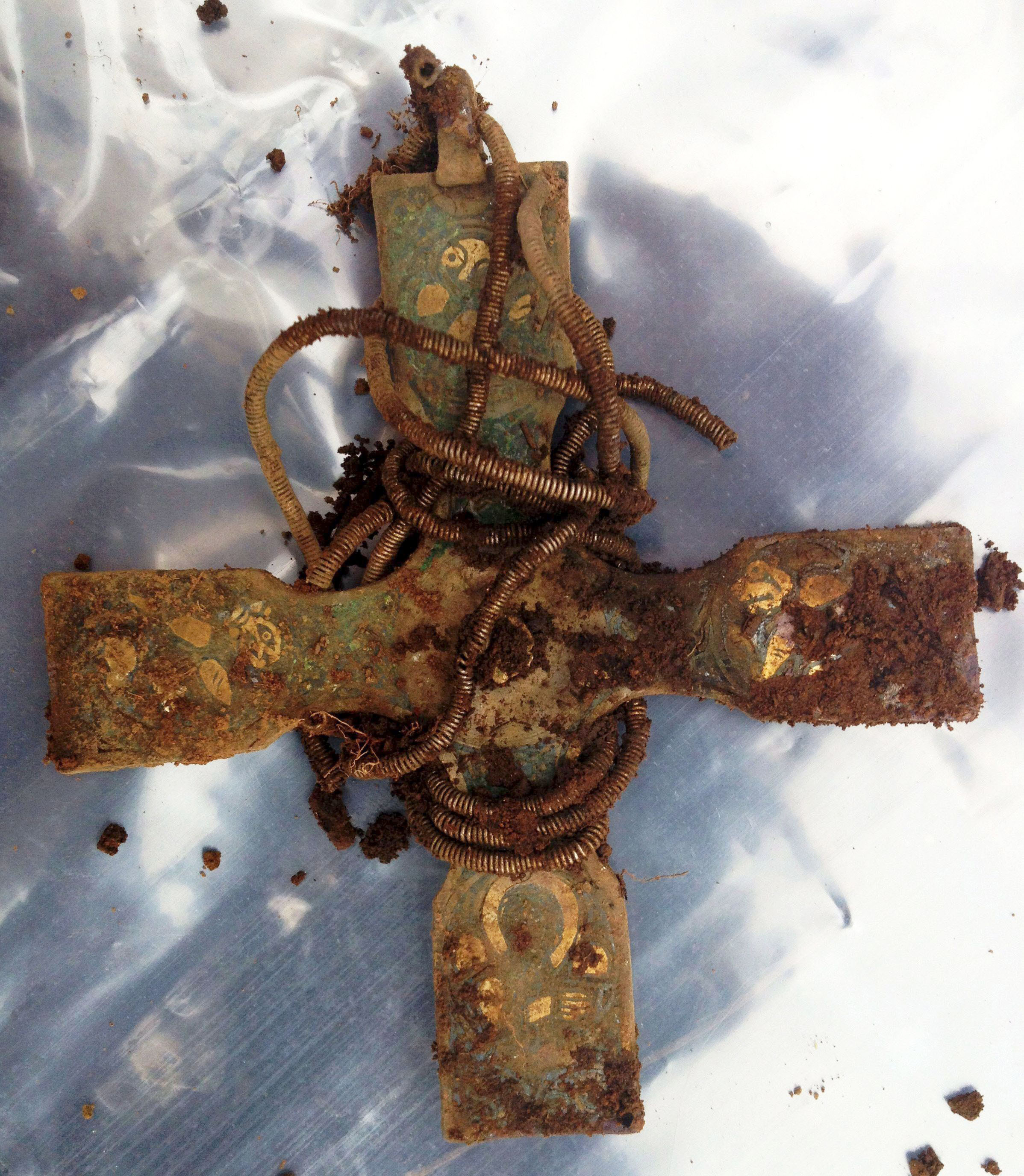 Dazzling Viking-era silver cross that 'belonged to Scottish king' revealed by experts | The US Sun