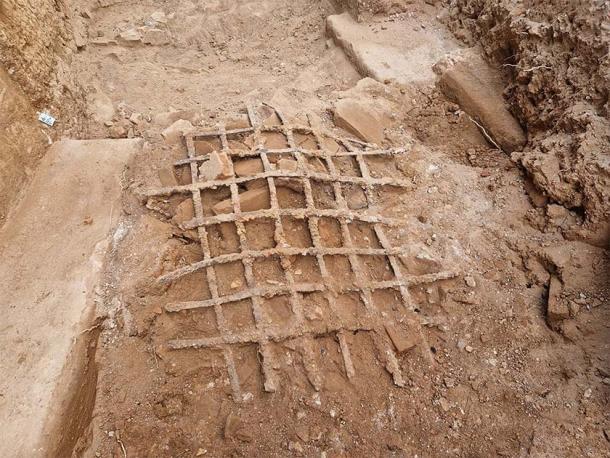 The iron window bars being excavated at the Roman baths unearthed in Mérida, Spain. (Consortium of the Monumental City of Mérida)