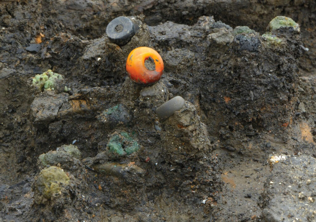 Uncovering the Global Connections of Bronze Age Britain: The Remarkable Beads of Must Farm