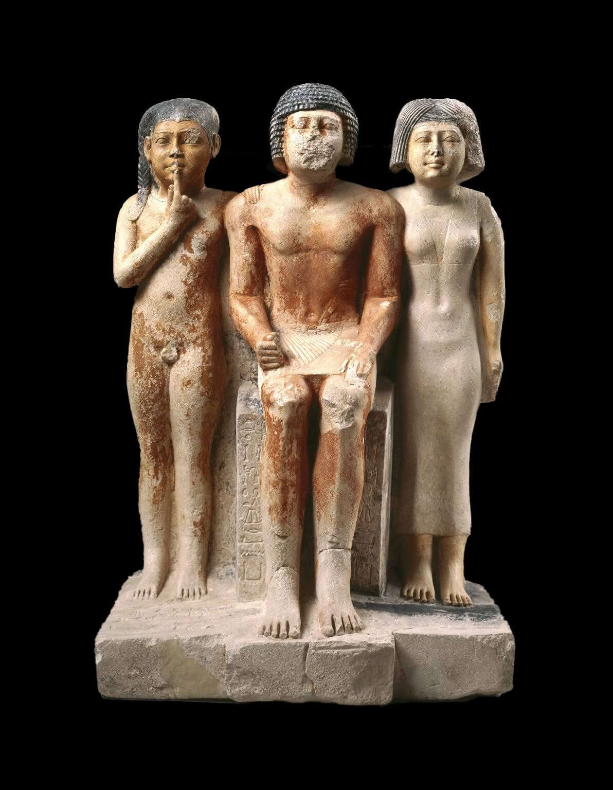 Triad statue of Ni-ka-re (Nykara), Inspector of the Scribes of the Granary,  and his family - Egypt Museum