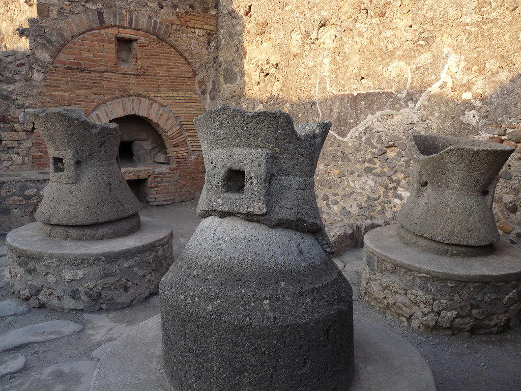 Roman millstones in Pompeii | View of a bakery in Pompeii, c… | Flickr