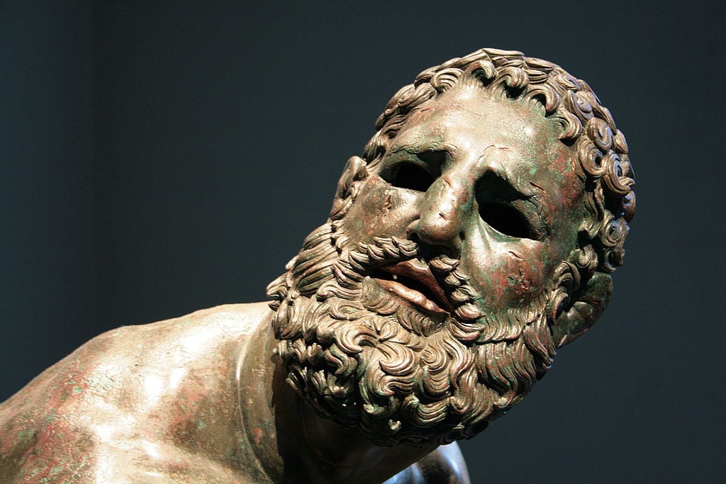 Sculpture of Ancient Greek Boxer Still Haunts Viewers Today - GreekReporter.com