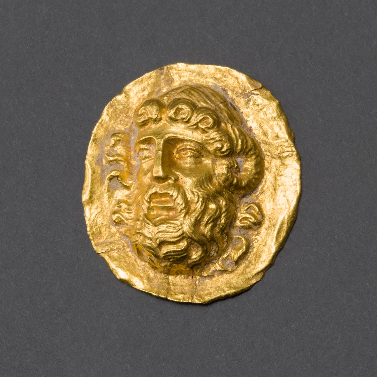 Hellenistic Gold Applique Depicting Zeus Ammon, 300 BCE - 100 BCE | Barakat Gallery